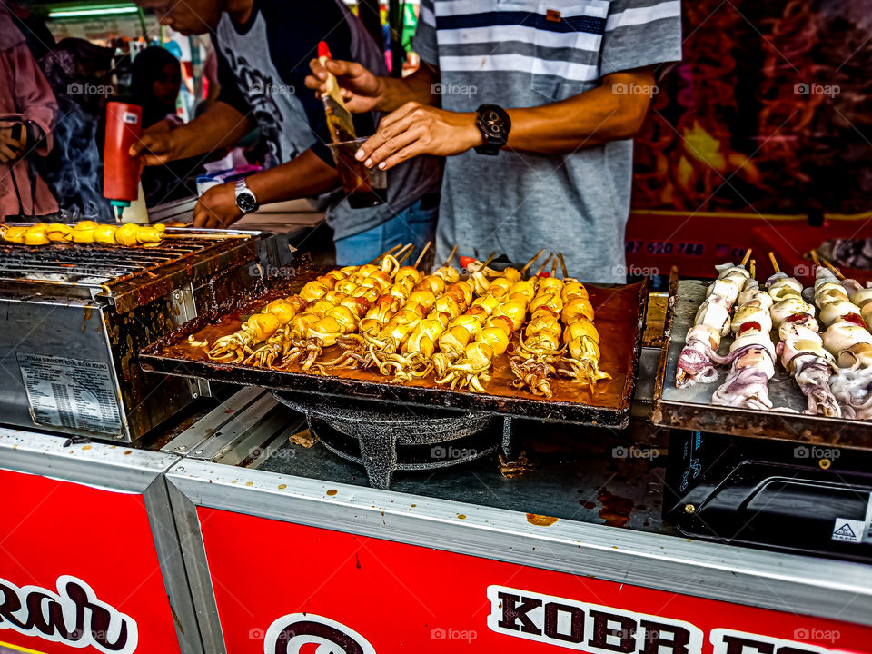 I came into Food Festival a few months ago and i found this food. It's uniq, there is squids and sausages  grill together, and when we eat with their sauces it's makes the food more tasted.