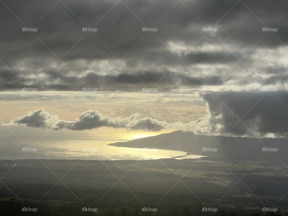 Sun peeking through clouds 