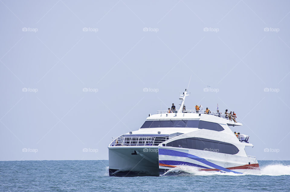 ferry boats transfers visitors in the sea at Koh Kood, Trat in Thailand. March 28, 2019