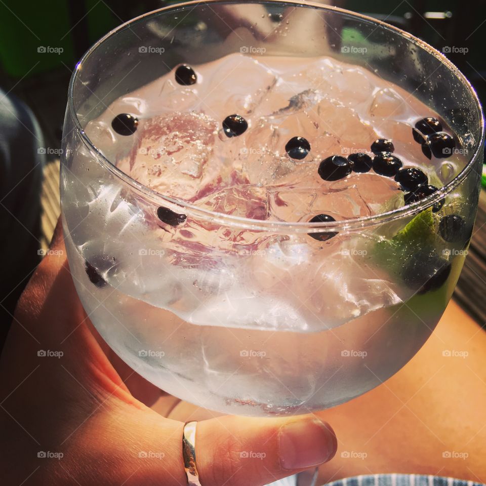 Gin and tonic with juniper berries