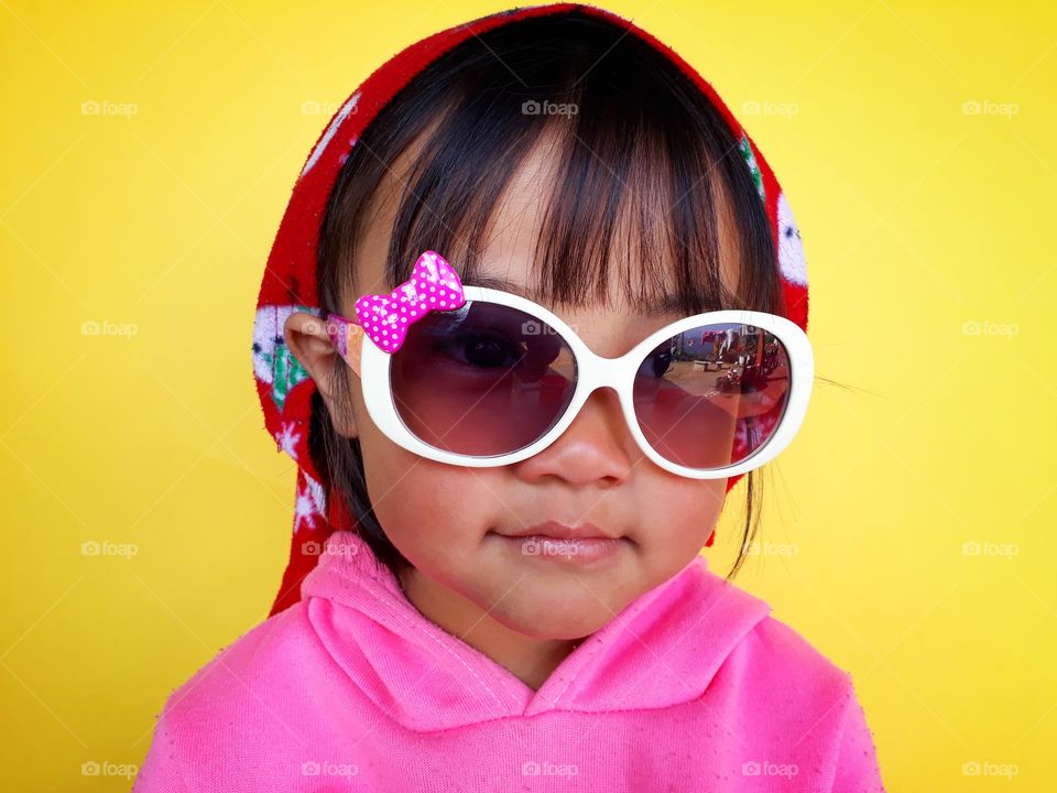 A bright and colourful portrait of a girl child