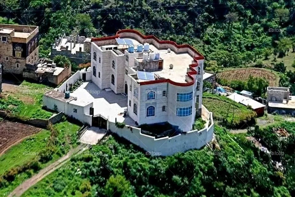A stunning view of green mountains covered in fog in Yemen