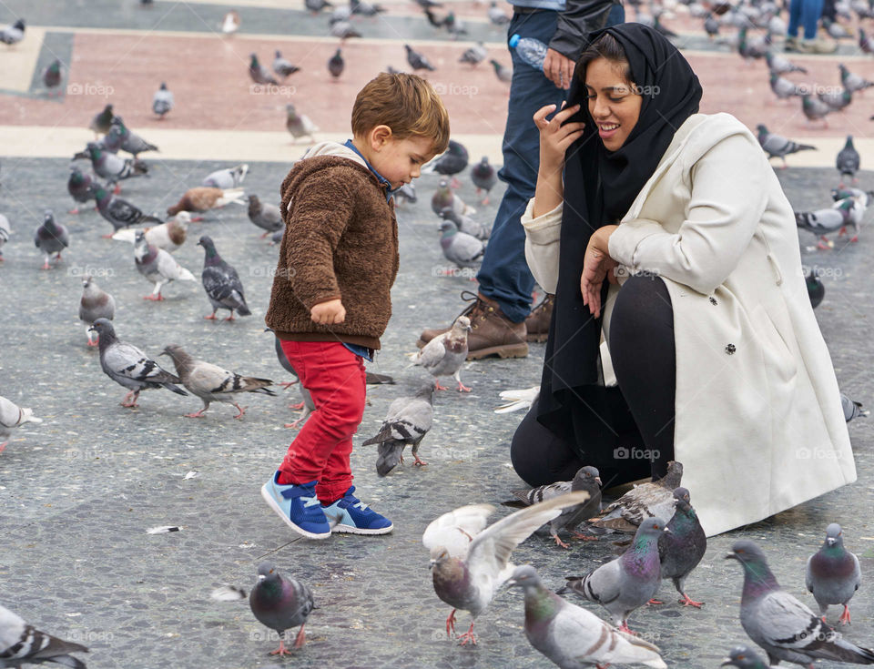 Mother, Son and Pigeons 