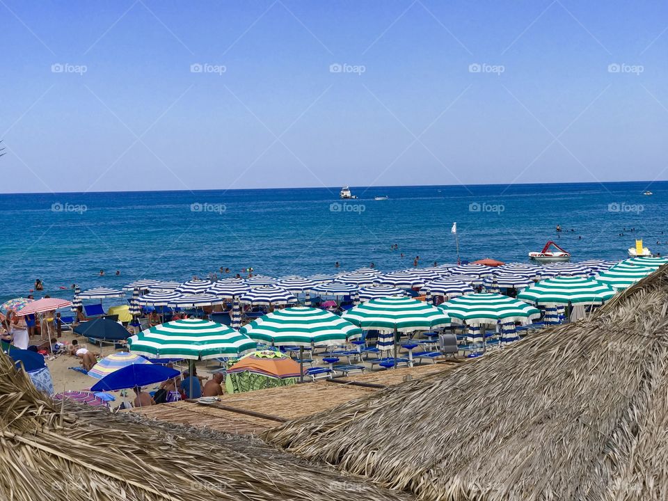 Colorful beach life in Cefalu, Sicily 