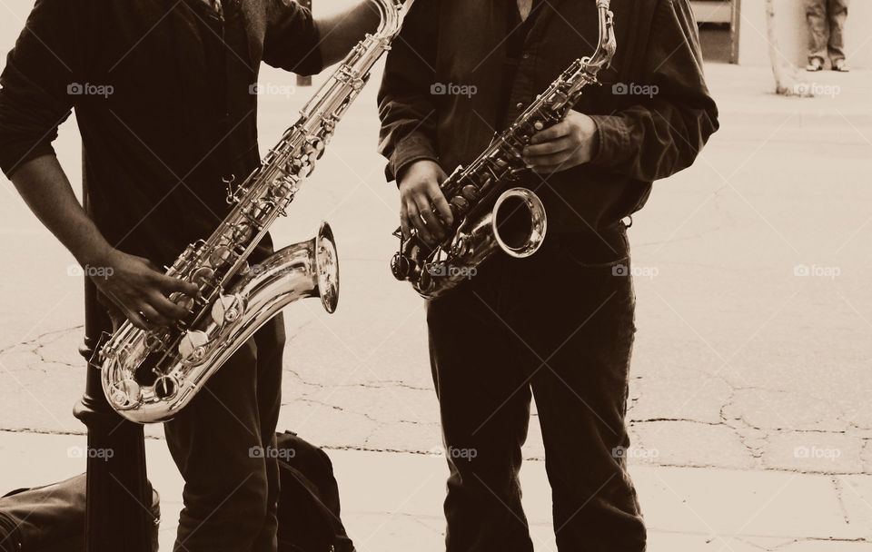 Saxophones on the Streets. Two sax players performer in downtown Denver during First Friday in 2013.