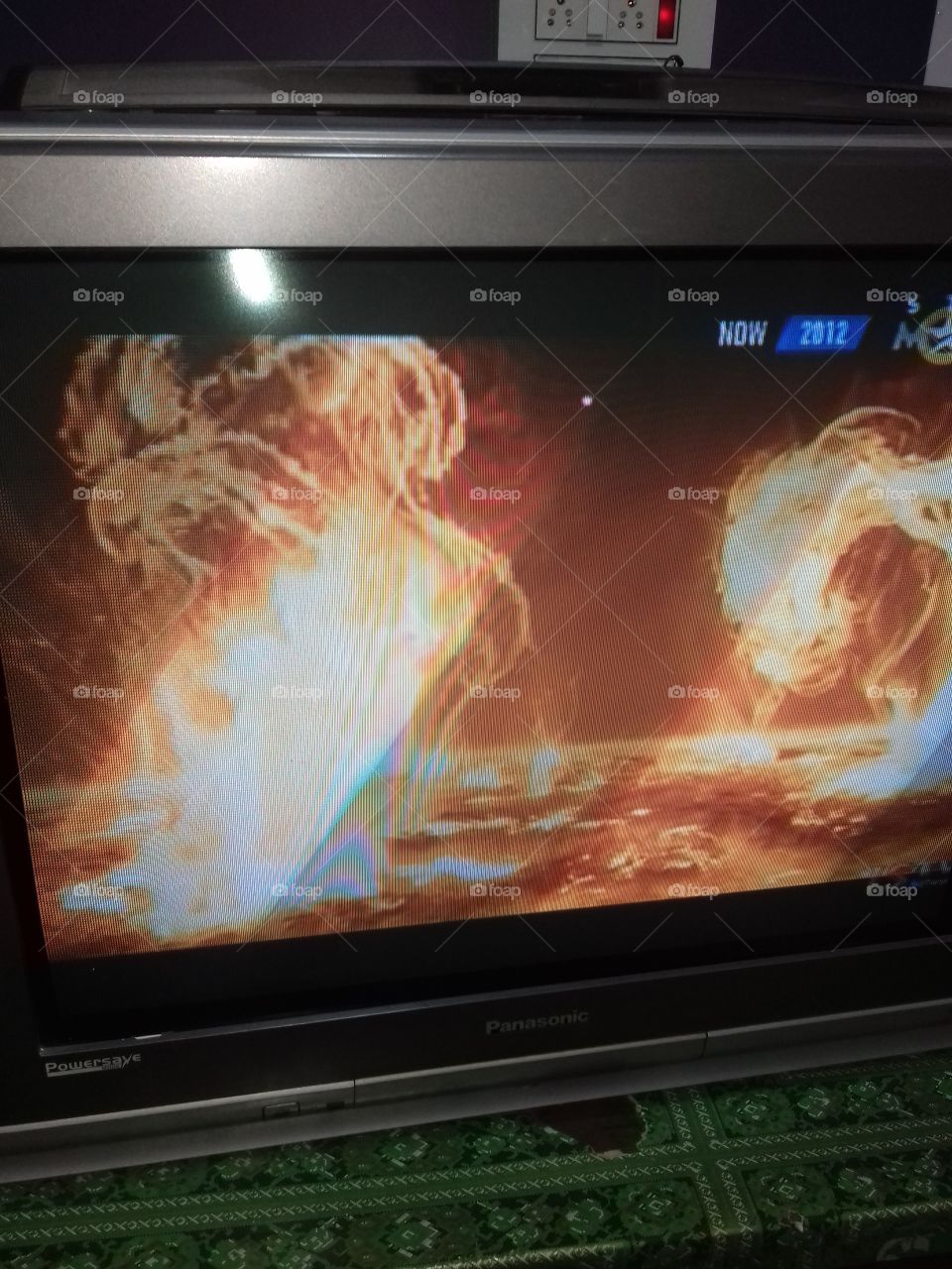 picture of explosion most likely atom bomb on tv