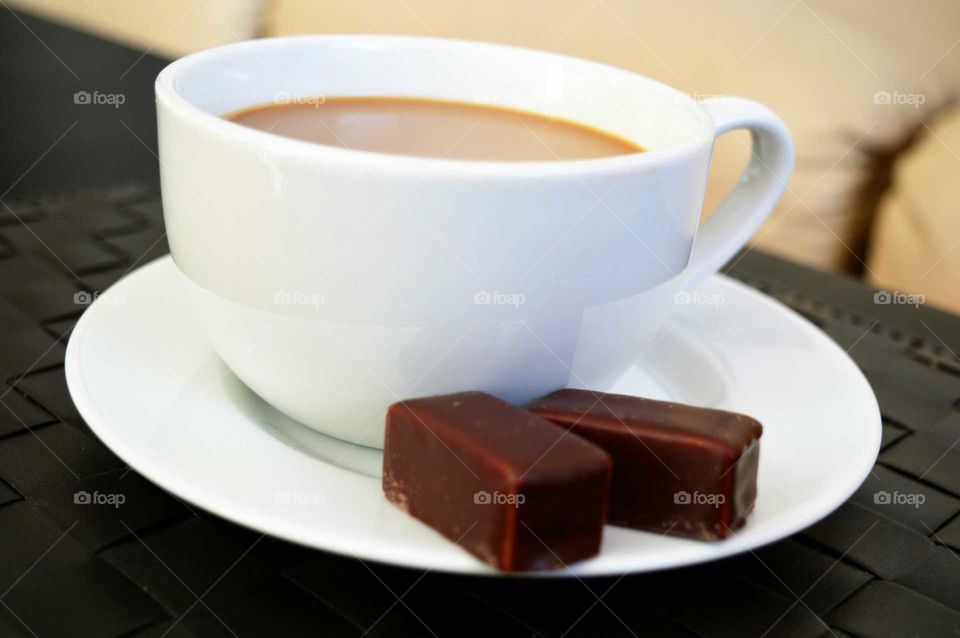 Close-up of coffee with sweet food