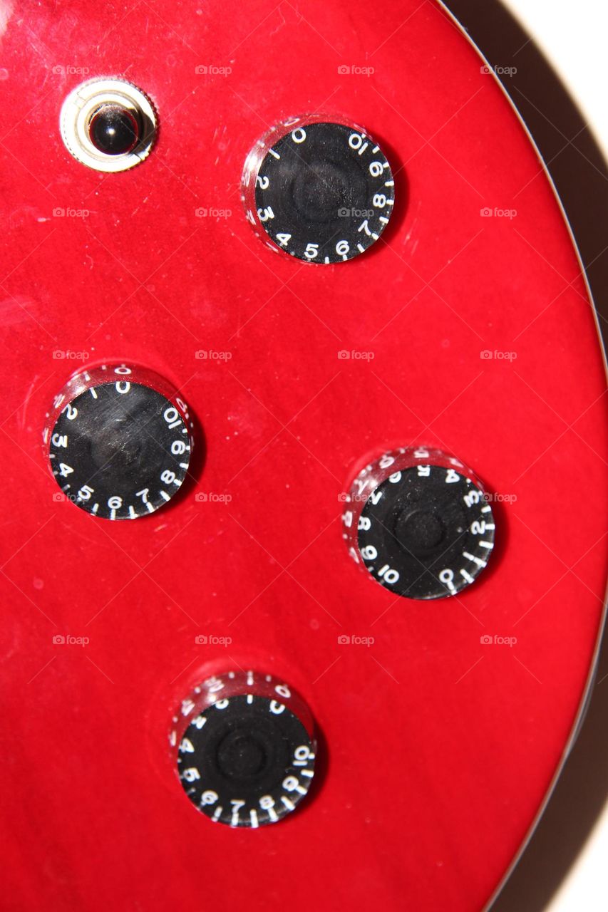 Electric guitar adjustment knobs circles