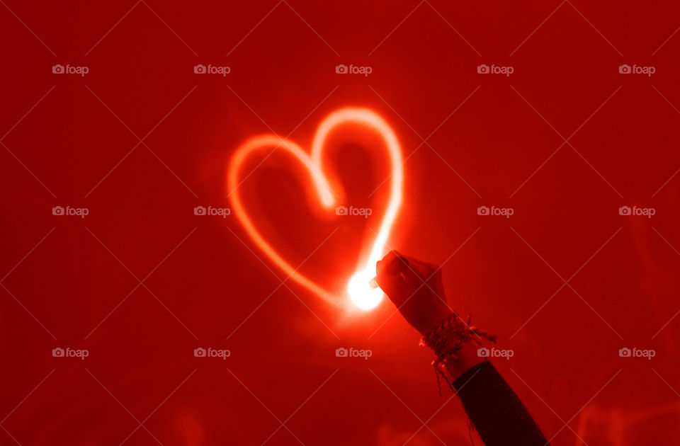 Drawing heart with light