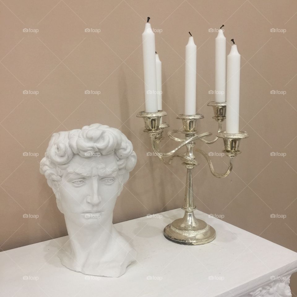 Statue and candles