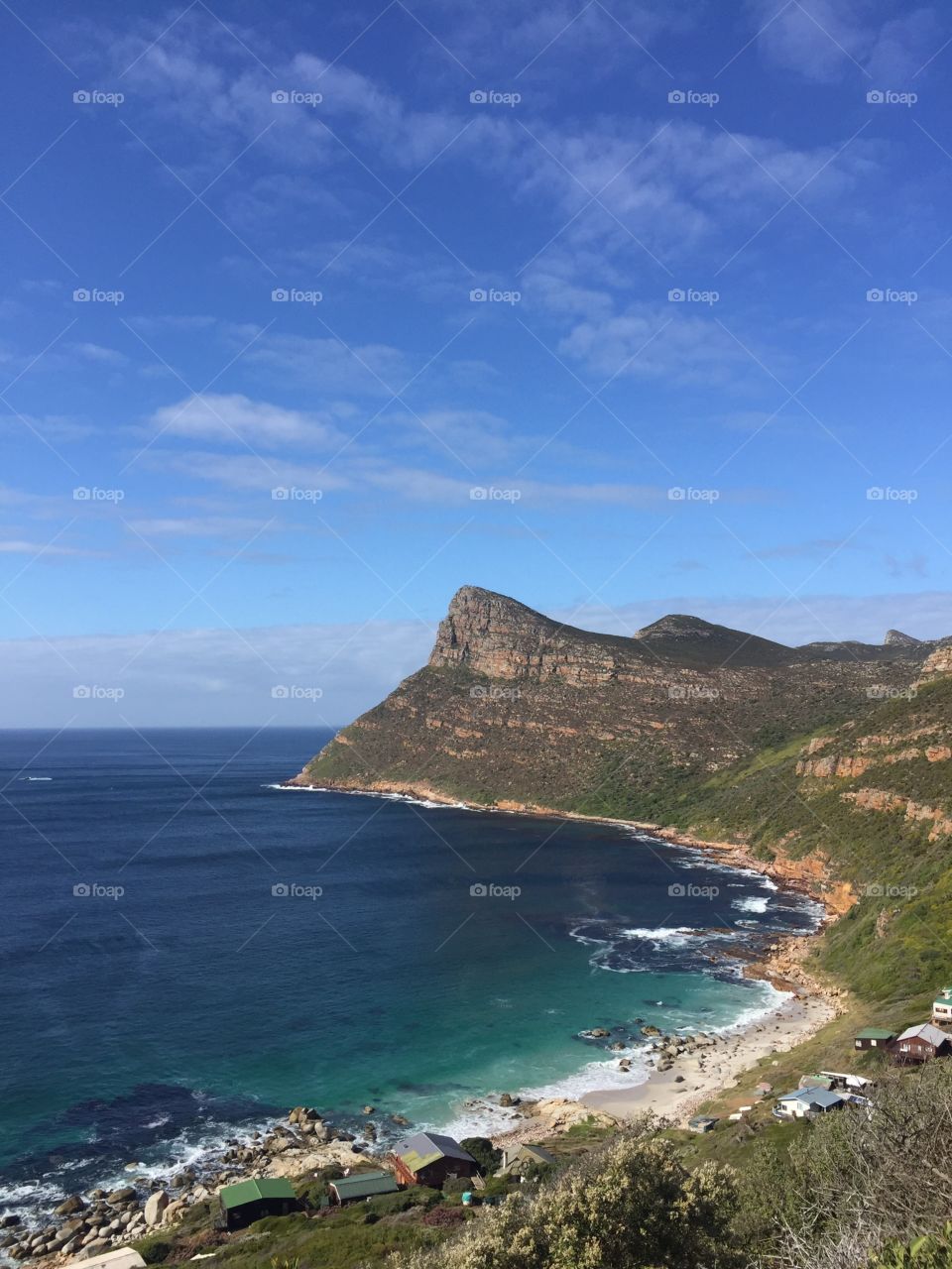 Scenic view of cliff at sea