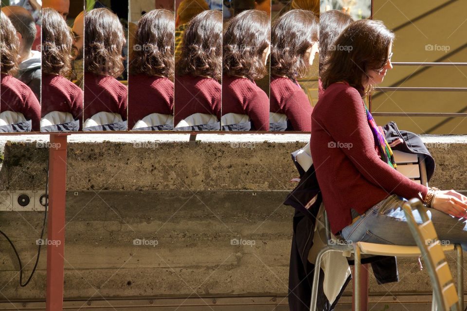 Woman's Reflection In Mirrot