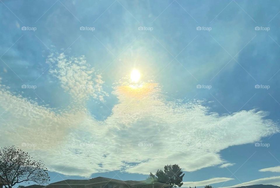 Ángels wings sitting on top of beautiful mountain.