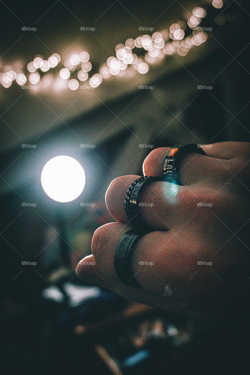 Black rings and lamp lens flare.