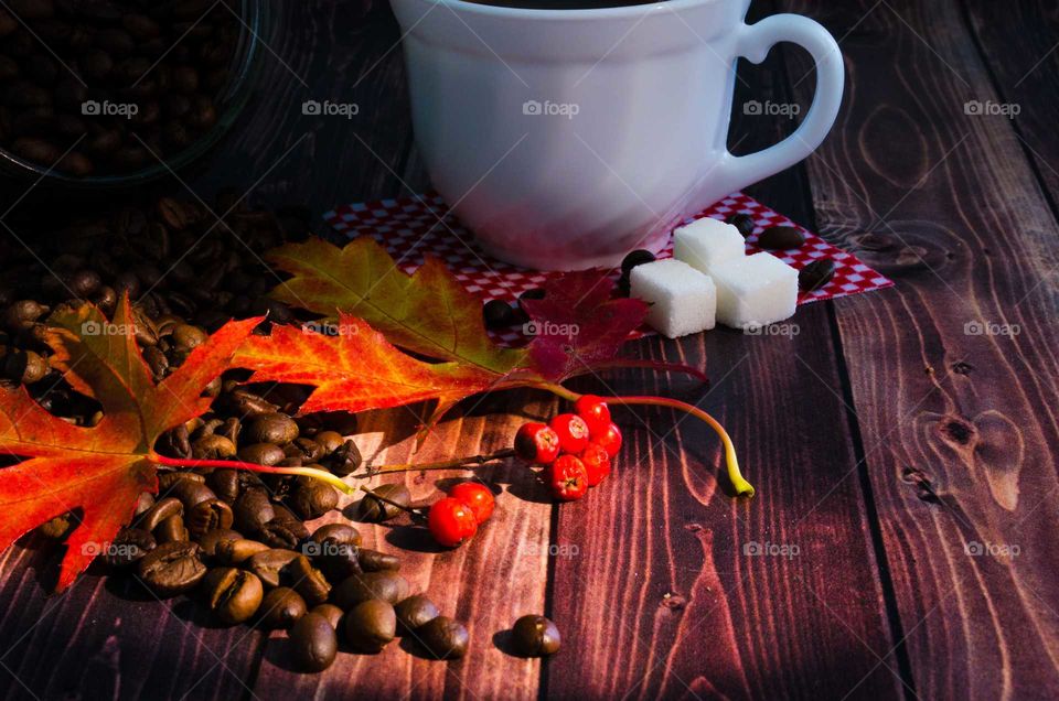 coffee been still life on wooden background