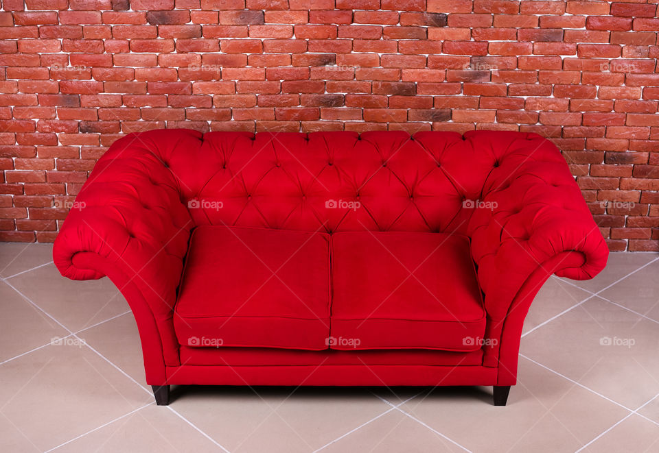 Red sofa on the floor