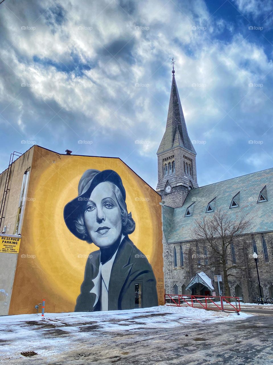 Jean Arthur mural on the wall of a parking lot in Plattsburgh, New York