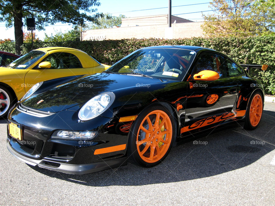 reflection porsche 911 gt3 rs black and orange by vincentm