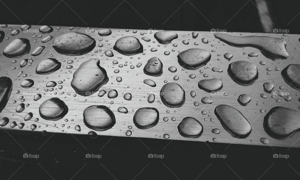 water drops on a steel handrail