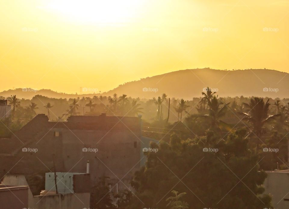 View of village during sunrise