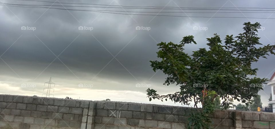 just before a heavy  rain when the cloud is heavy grey. 🖤💫