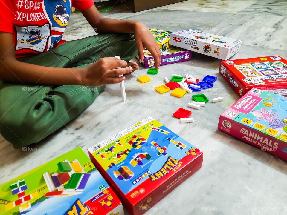 Kid playing with blocks