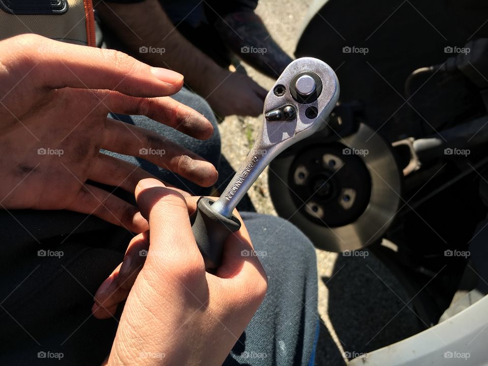 Mechanic kid with tool for work