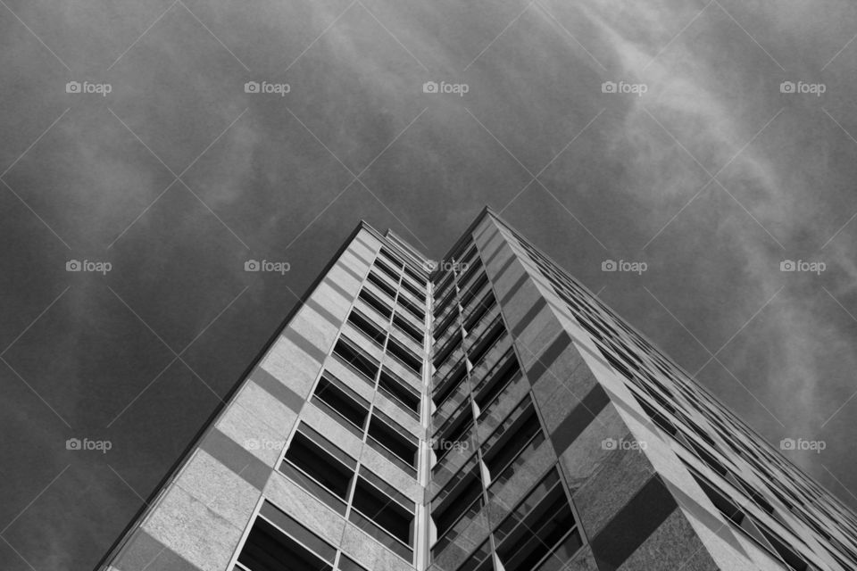 architecture, a black and white photo of a building reaching the sky