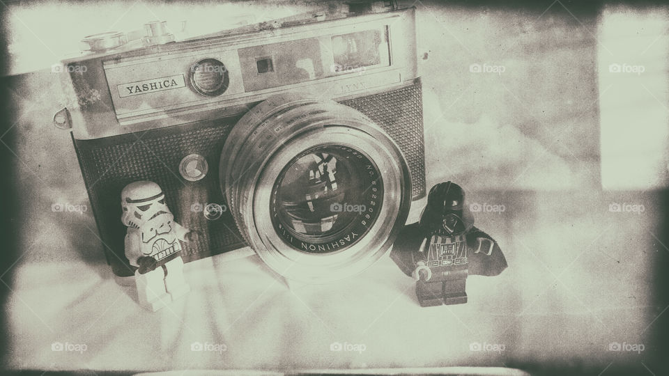 Vintage bring back old memory. photo of old vintage Yashica camera and star wars Lego figurines