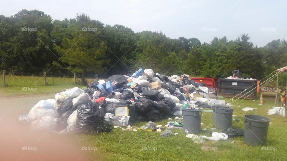 a pile of trash after a festival
