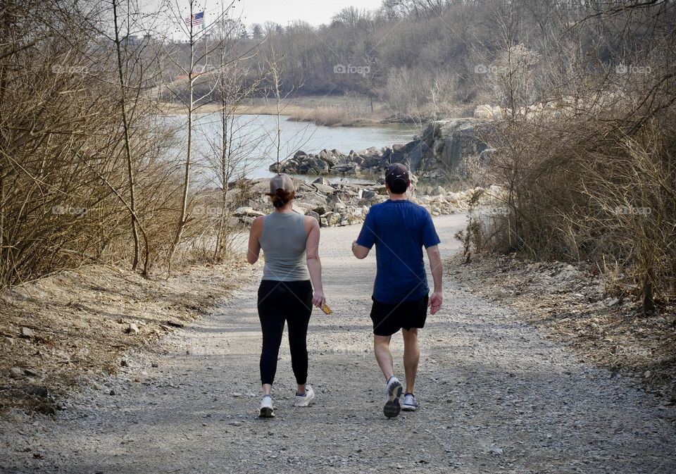 A couple go hiking at the local metro park. It’s a good walk. Perfect opportunity to reconnect.