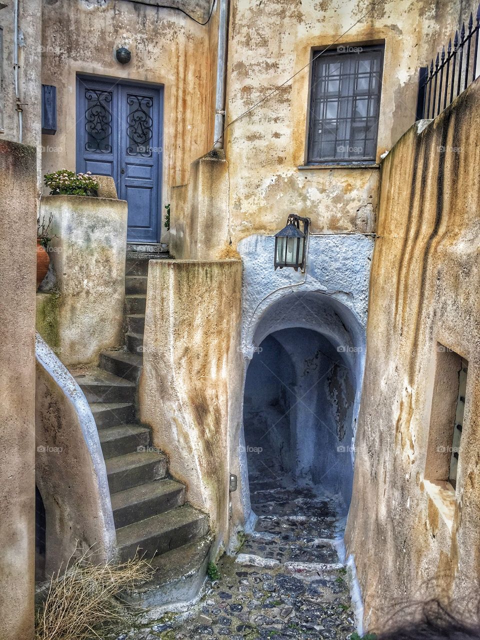 Walking through the narrow corridors of Santorini villages , discovering the beautiful sights hidden from the clouds, ready to be found by those who love exploring.