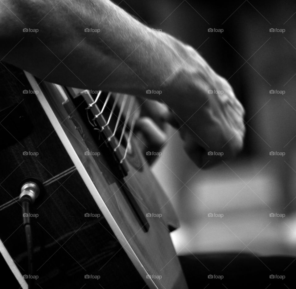 Making music , guitar player . 