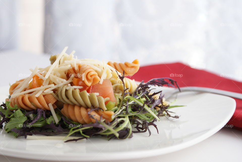 Close-up of salad with pasta