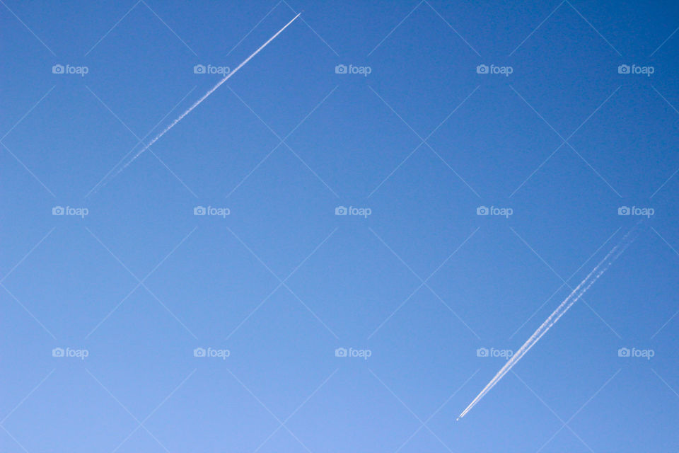 Two Airplane in clear sky