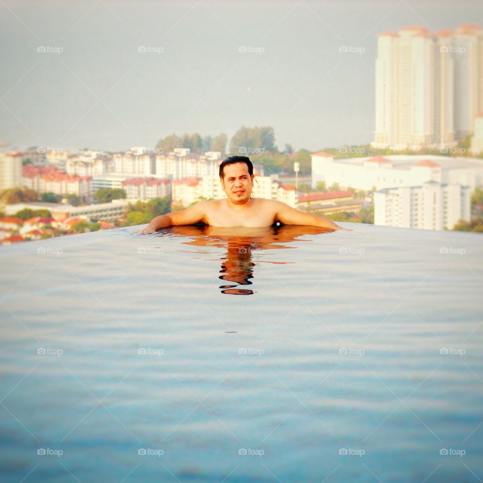  A photo of myself at the pool on the 46th floor new condominium in Penang island malaysia.
