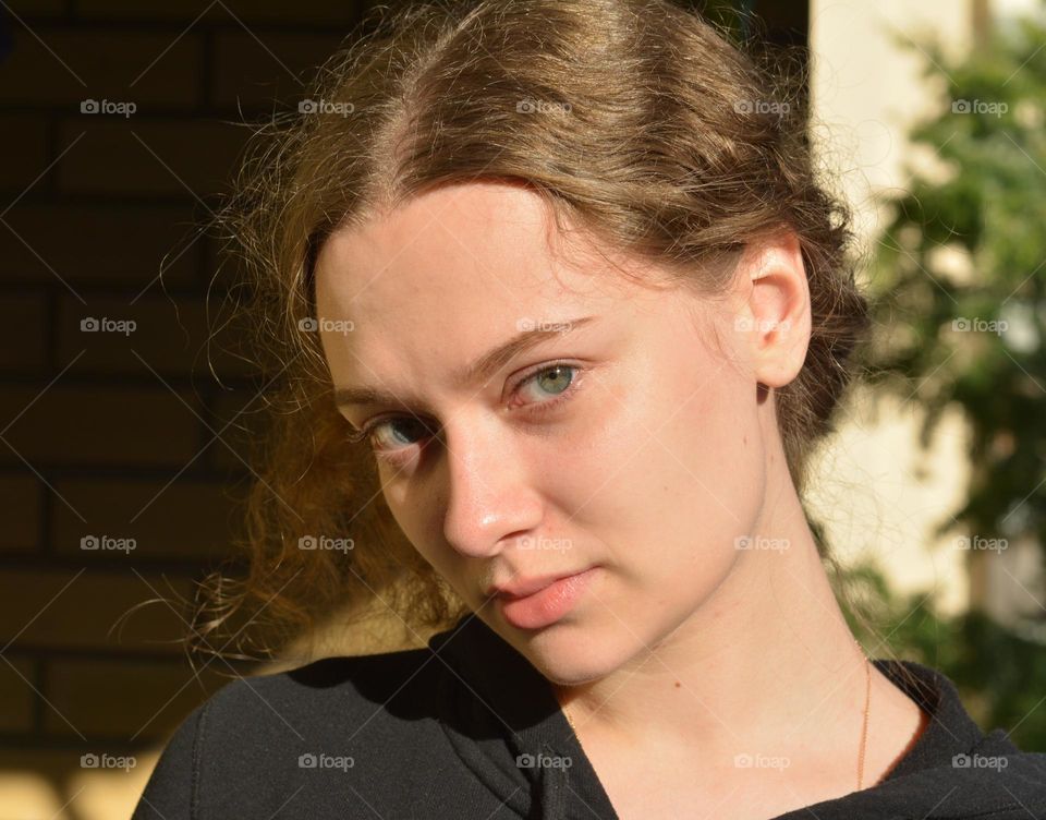 young girl beautiful portrait in sunlight