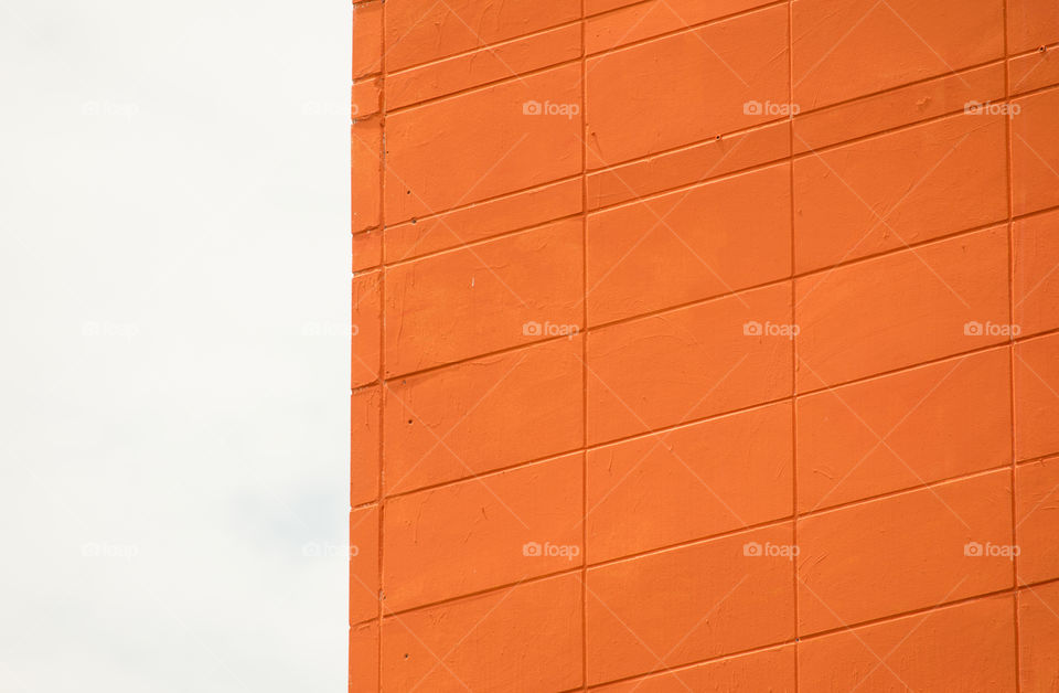 Orange painted stone concrete brick building