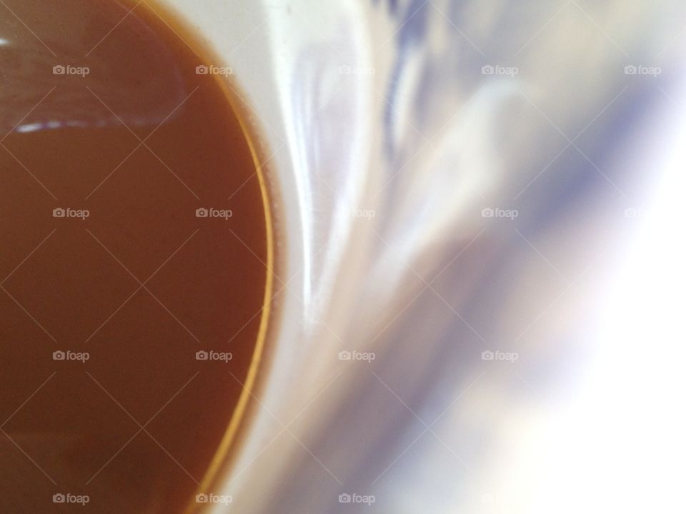 I got inspired one day having my morning coffe . I took many snaps of my white and blue porcelain cup filled with coffe