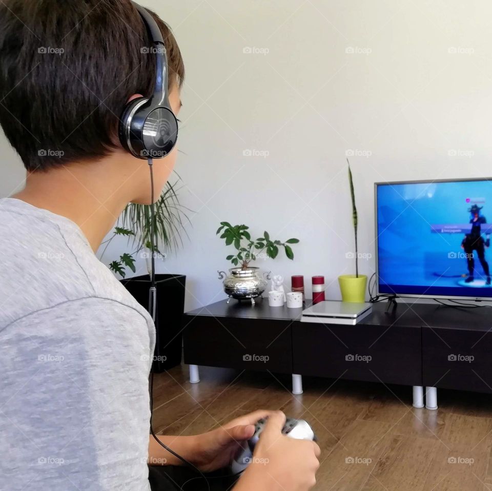 Young boy playing video games