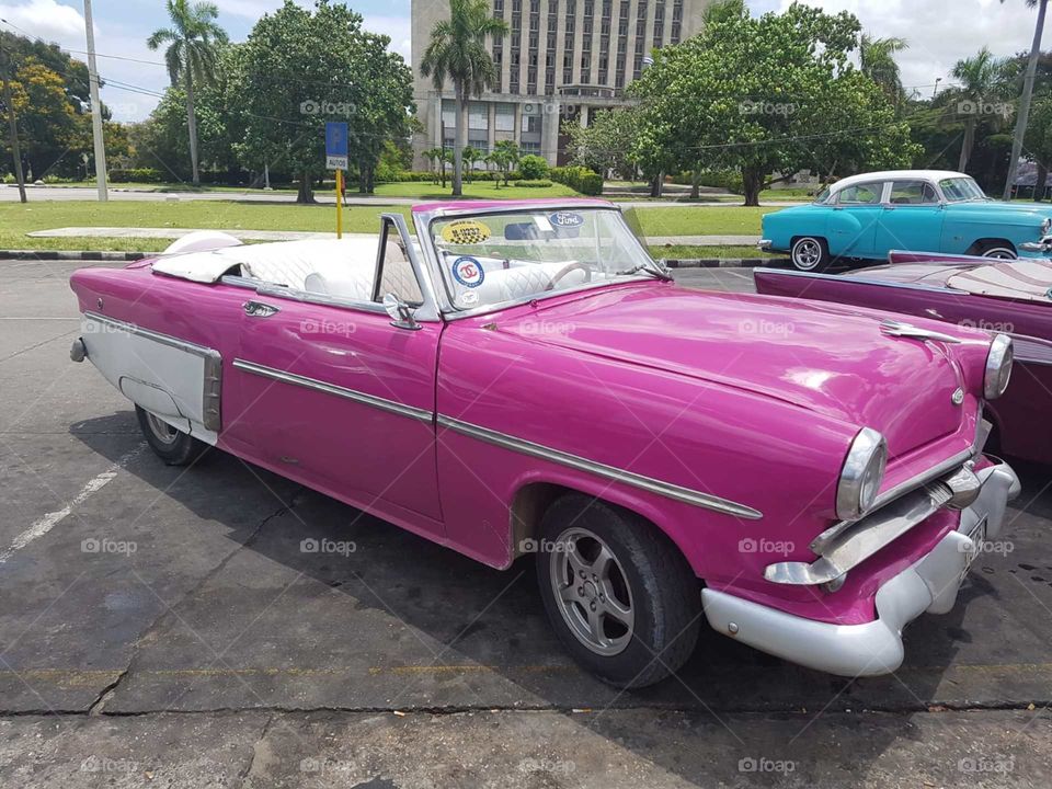 Nice old car in Havana. The pink are awesome