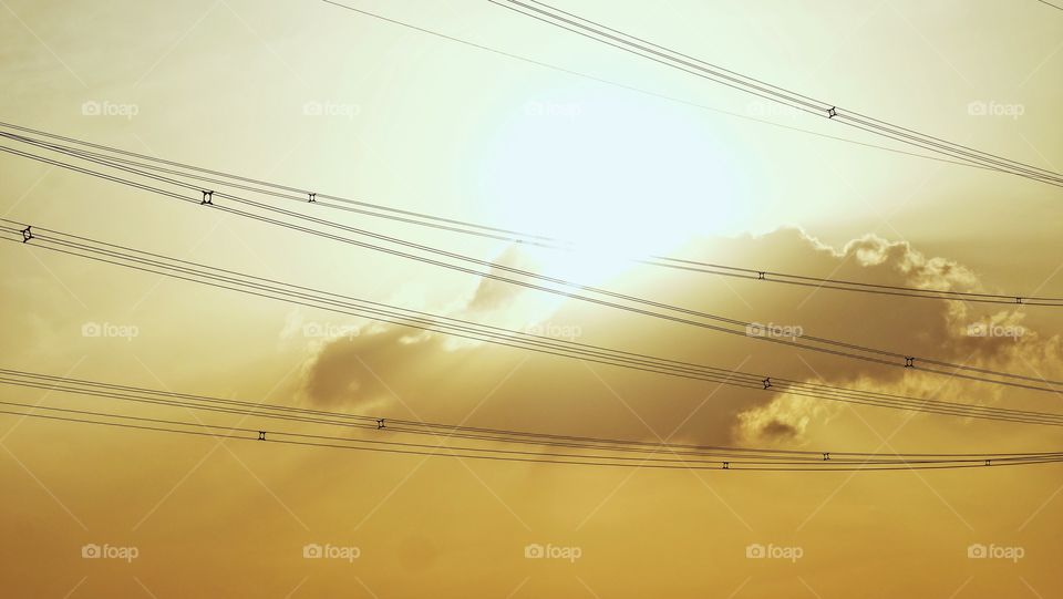 The sun behind clouds