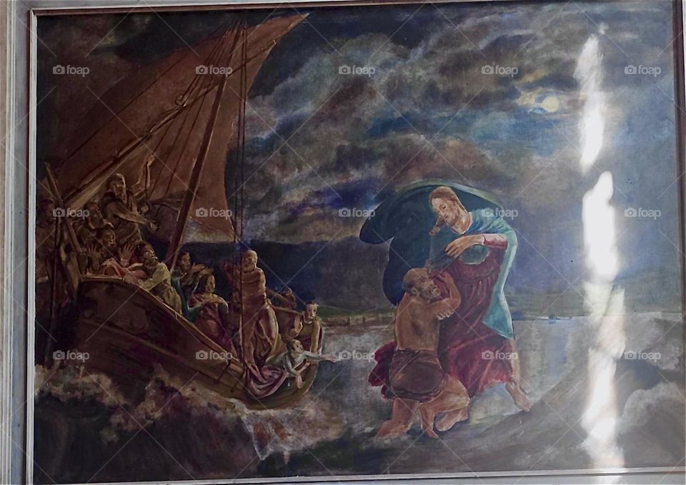 This is the altar painting at the parish church of “Altenkirchen” on the island “Rügen” in “Western Pomerania”, Germany of the apostle “Peter” almost drowning as he attempts to walk towards “Jesus” on the water. 2024. Hypnotic Productions
