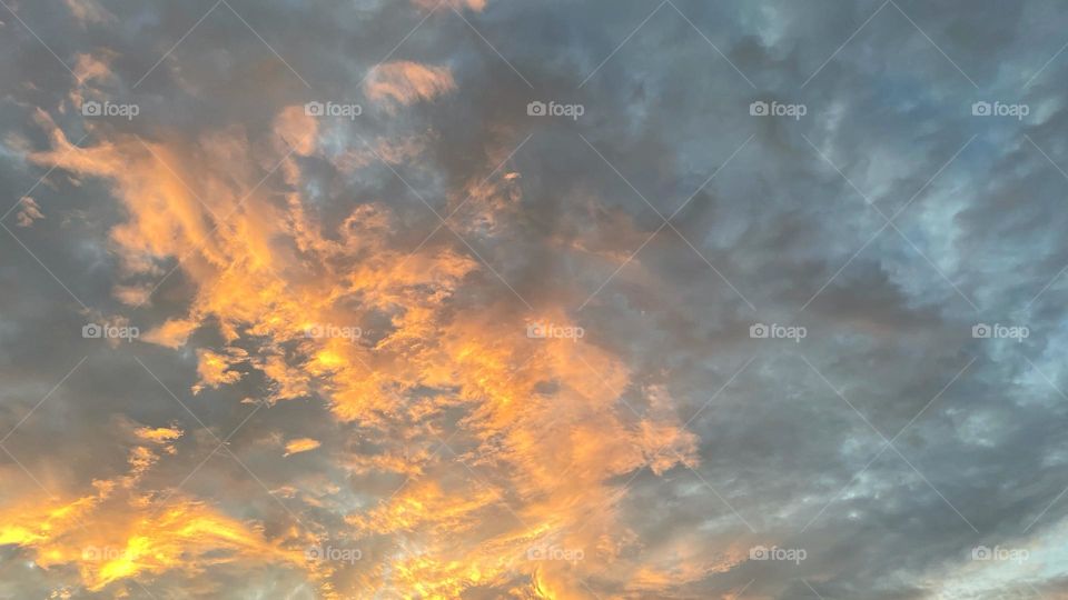 Clouds during dusk showing orange sunset colors