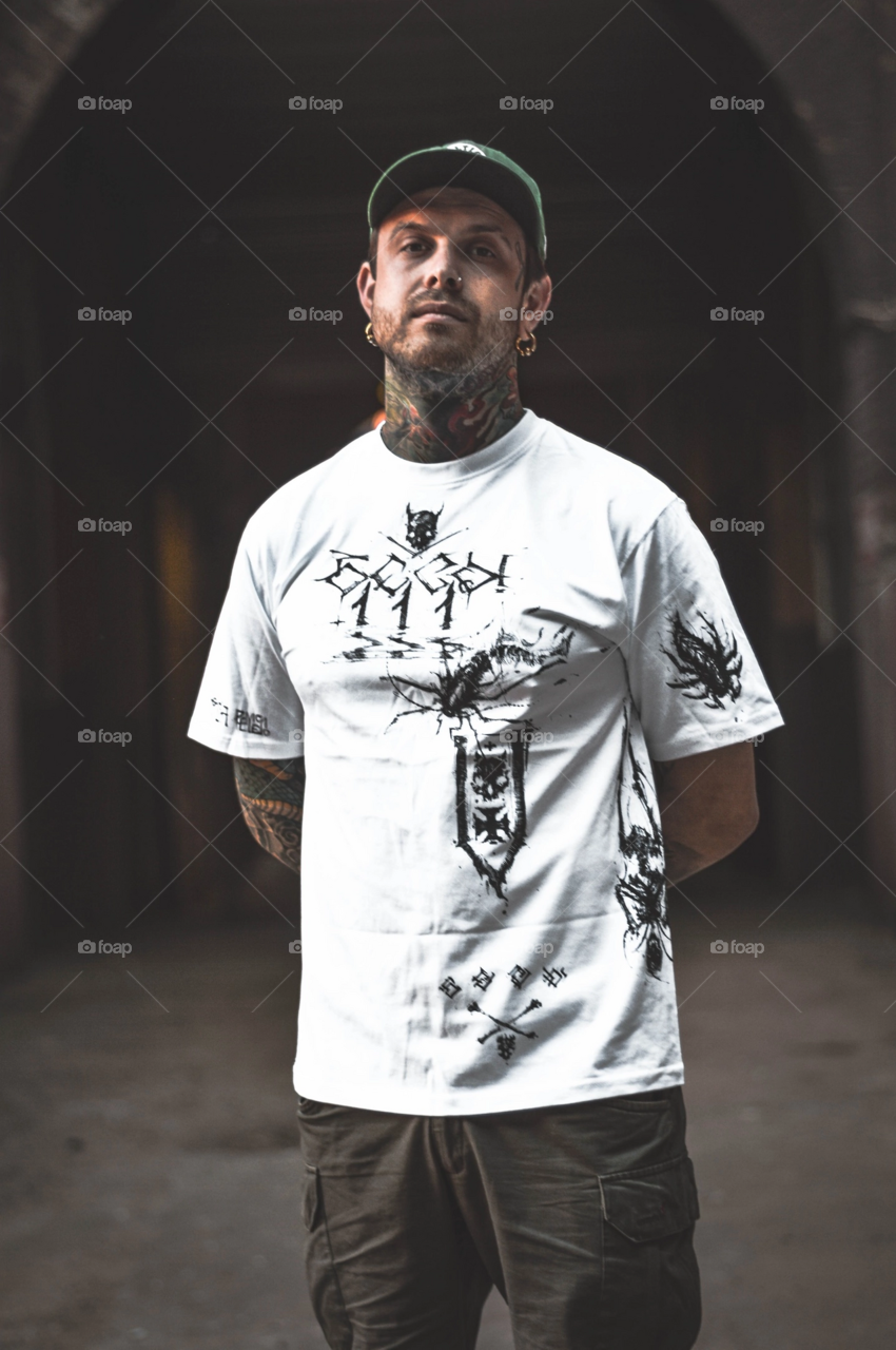 guy in cool t-shirt and tattoo