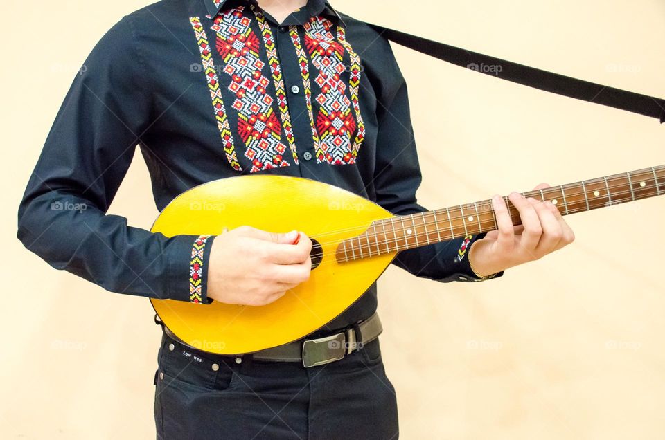 Playing An Instrument, the Bulgarian tambura