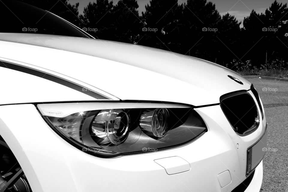 BMW E92 headlight closeup.