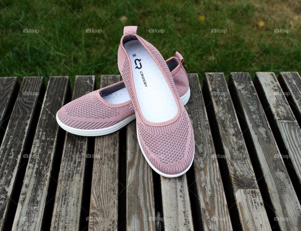 Where is the owner of this girly shoes?