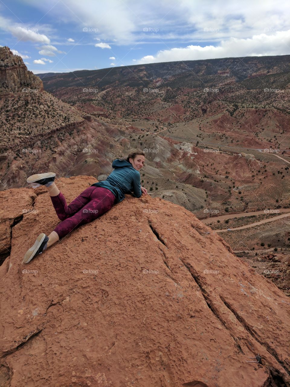 Girl at cliff's edge in Capitol Reef Nat'l Park
