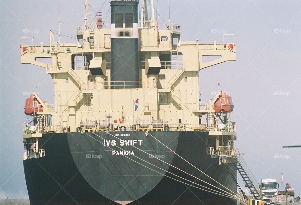 cargo ship in the harbor.  shot with a 35mm Canon film camera